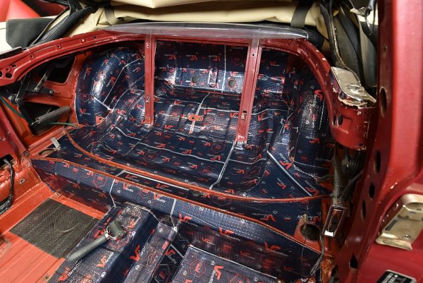 Car interior floor covered with 4mm sound deadening mats, view 1
