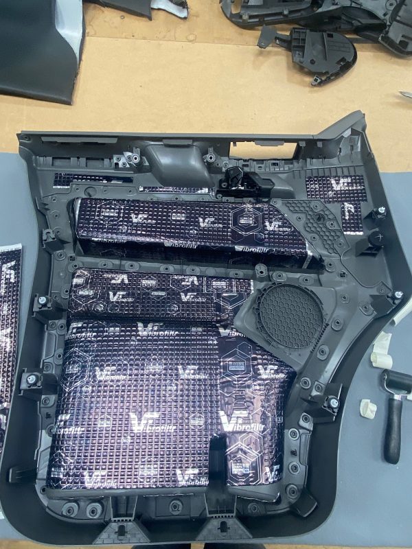 1.5mm sound deadening mats applied to the flat surfaces of a van door card