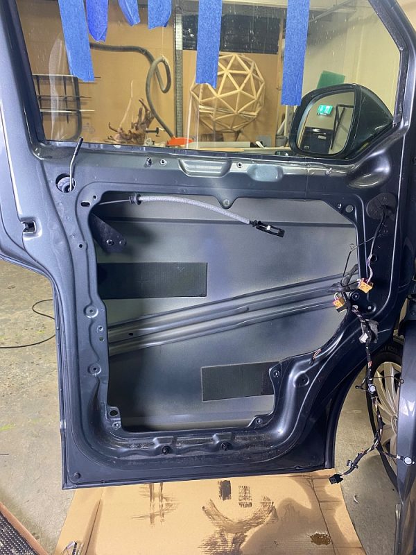 Metal door partition removed to reach the inside of the van door