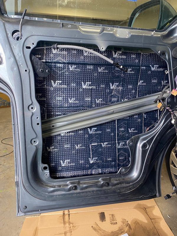1.5mm sound deadening mat applied to the inside of a van door